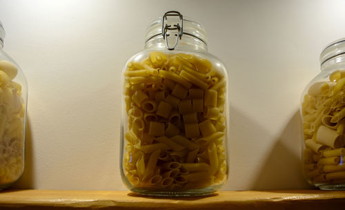 Close-up of drink in glass jar on table