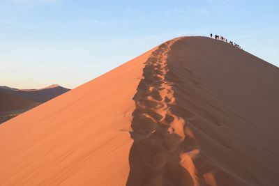 Scenic view of desert against sky