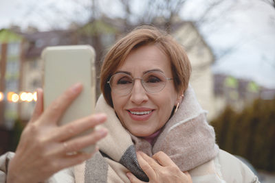 Young woman using mobile phone