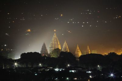 Panoramic view of illuminated buildings at night