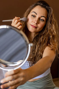 Portrait of young woman looking away