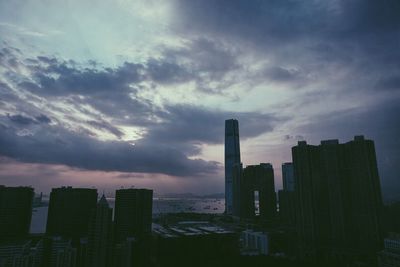 Cityscape against dramatic sky