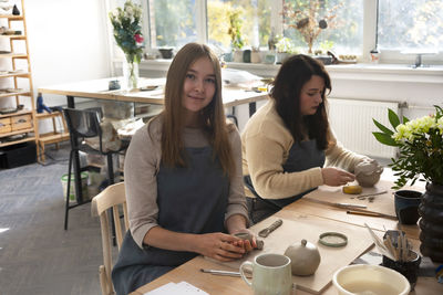 Students learn to sculpt ceramic products from clay. pottery workshop class. artisan production.