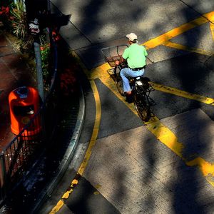 High angle view of people riding bicycle