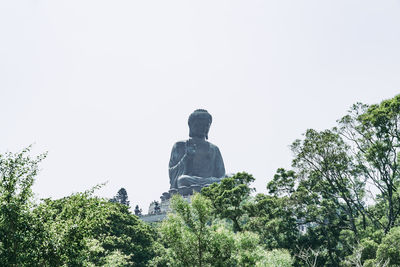 Low angle view of statue against clear sky