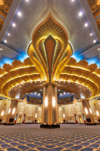 Low angle view of illuminated building at night