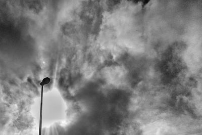 Low angle view of street light against sky