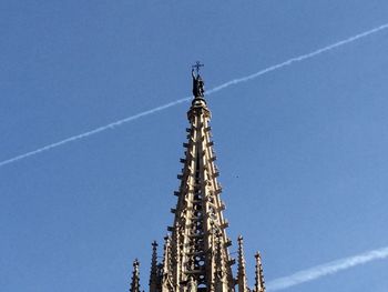 Low angle view of building against blue sky