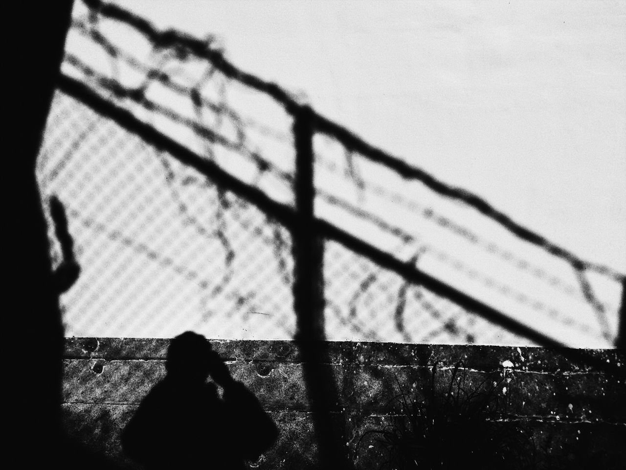 shadow, focus on shadow, sunlight, one person, lifestyles, silhouette, real people, outdoors, day, low section, close-up