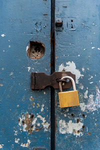 Close-up of padlock on door