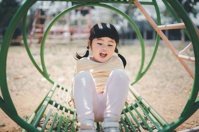 Cute girl playing at playground