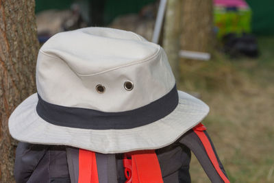 Close-up of hat on field