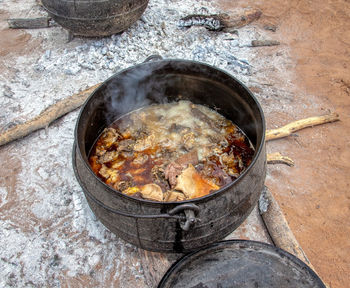 High angle view of meat in cooking pan