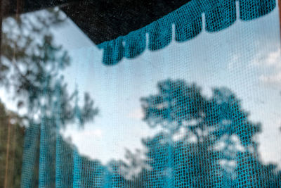 Close-up of modern building seen through window