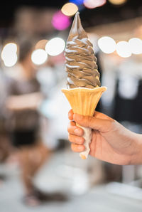 Close-up of woman holding ice cream