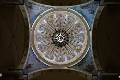 Low angle view of ornate ceiling in building