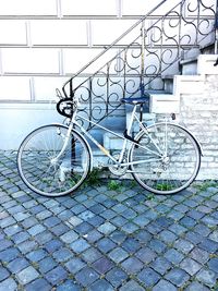 Bicycle on metal in city