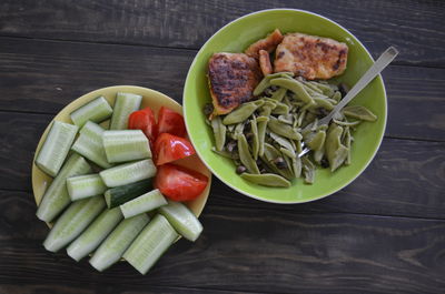 High angle view of chopped vegetables in bowl on table