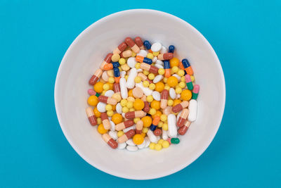 High angle view of multi colored candies on table
