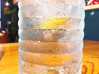 Close-up of beer glass on table