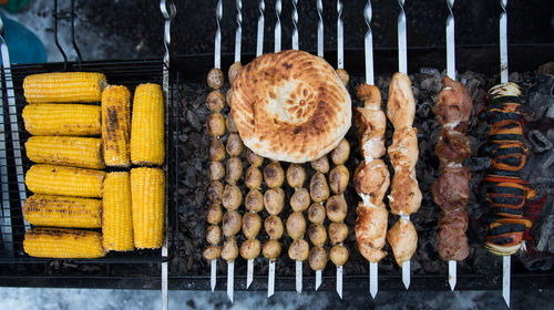 Close-up of meat on barbecue grill