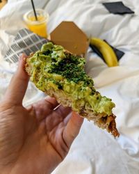 Close-up of man holding food