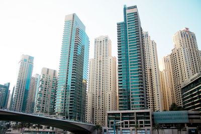 Low angle view of modern buildings against clear sky