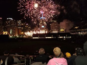 View of firework display at night