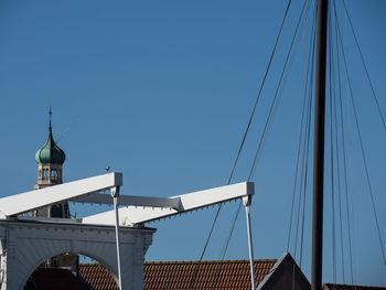 Low angle view of building against blue sky