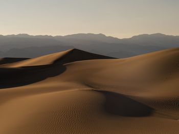 Scenic view of desert against sky