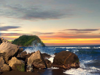 Scenic view of sea against sky during sunset