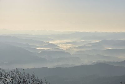 Scenic view of mountains against sky during sunset