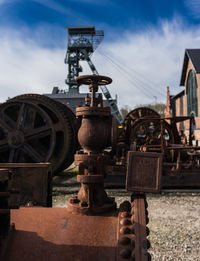 Machinery against sky