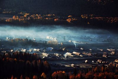 Panoramic view of farm against sky