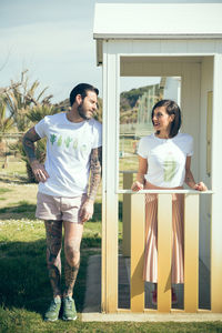 Portrait of hipster couple on front porch