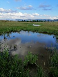 Scenic view of lake against sky