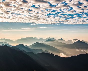 Scenic view of mountains against sky during winter