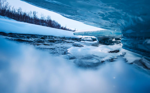 Ice formations created by the flow of the river in abisko nationalpark.