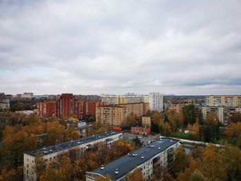 High angle view of buildings in city against sky