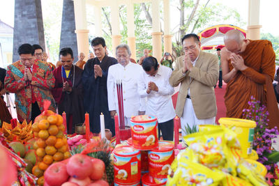 Group of people at market stall