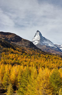 Scenic view of mountains against sky during autumn