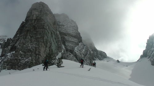 Scenic view of snow mountains against sky