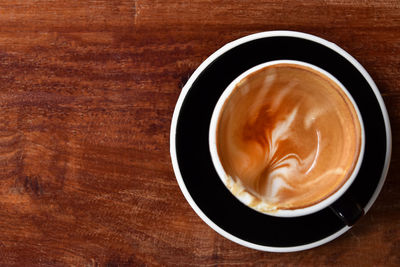 Directly above shot of cappuccino on table