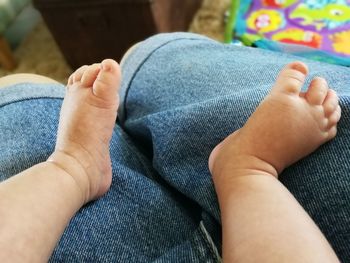 Low section of baby feet