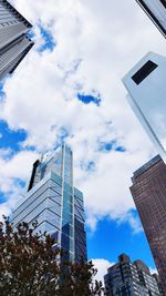 Low angle view of modern buildings against sky