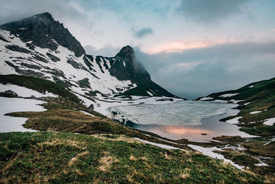 Landscape picture of rappensee with snow during sunrise 