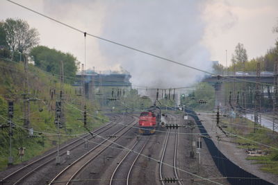 View of steam engine train against the sky