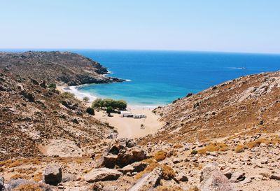 Scenic view of sea bay against clear sky