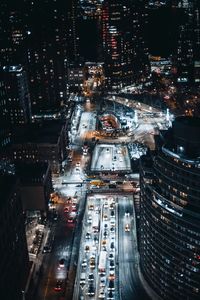 High angle view of illuminated cityscape at night