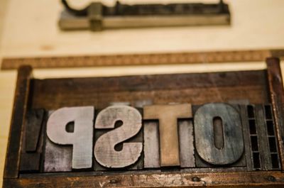 Close-up of text on wood